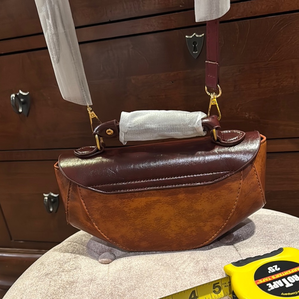 Brown Vegan Leather Clutch with Decorative Clasp and Structured Design - Picture 8 of 9